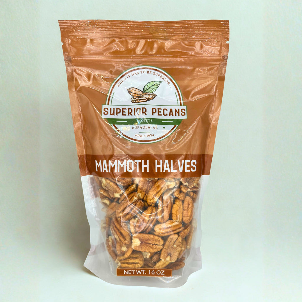 Bag of Superior Pecans Mammoth Halves on a light green background